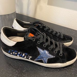 Golden Goose Sneakers. Black suede with blue star and writing.